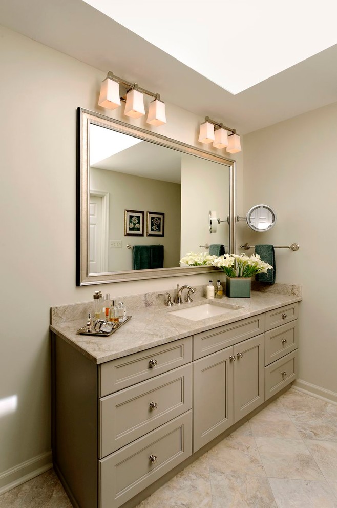 Inspiration for a large timeless master multicolored tile and stone tile travertine floor corner shower remodel in DC Metro with an undermount sink, recessed-panel cabinets, green cabinets, granite countertops, a one-piece toilet and white walls