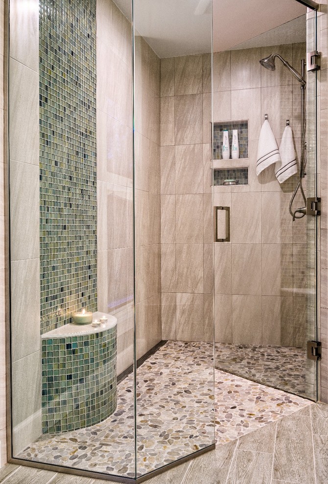 Inspiration for a traditional bathroom in Detroit with a built-in shower, blue tiles, green tiles and beige walls.