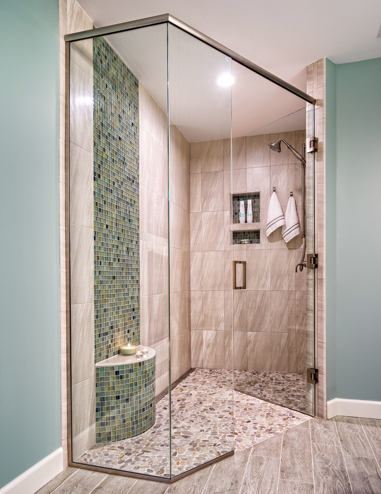 Inspiration for a large transitional 3/4 beige tile and porcelain tile dark wood floor and brown floor walk-in shower remodel in Detroit with blue walls and a hinged shower door