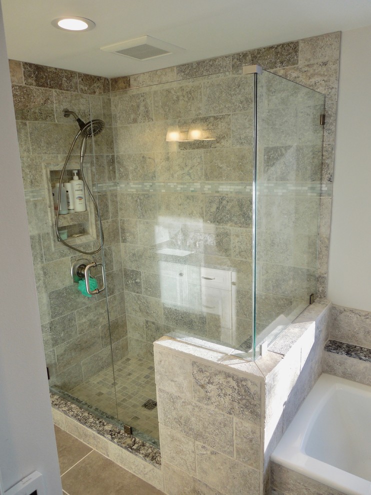 Inspiration for a large classic ensuite bathroom in Detroit with raised-panel cabinets, white cabinets, a built-in bath, a walk-in shower, grey tiles, stone tiles, grey walls, ceramic flooring, a submerged sink, engineered stone worktops, beige floors and a hinged door.