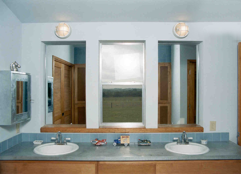 Bathroom - industrial bathroom idea in Austin