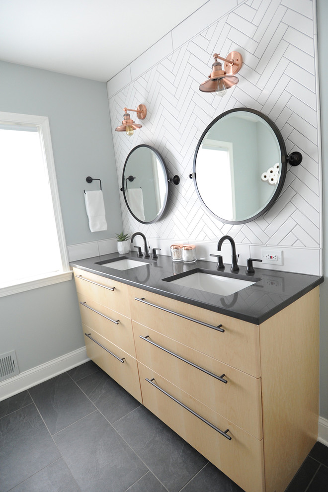 Mid-sized urban master white tile and porcelain tile ceramic tile and gray floor bathroom photo in Baltimore with flat-panel cabinets, light wood cabinets, a two-piece toilet, green walls, an undermount sink, granite countertops and gray countertops
