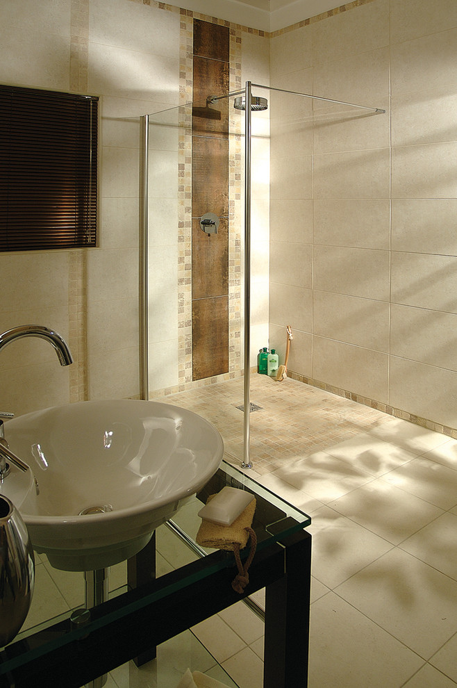 Example of a mid-sized transitional master beige tile and ceramic tile ceramic tile walk-in shower design in Cleveland with a wall-mount sink, open cabinets, medium tone wood cabinets, glass countertops and beige walls