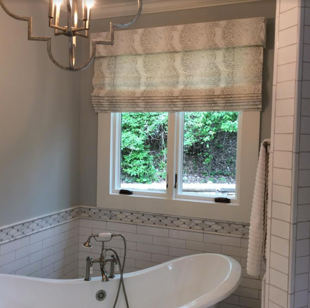 Design ideas for a classic bathroom in Nashville with a freestanding bath, white tiles, metro tiles and grey walls.