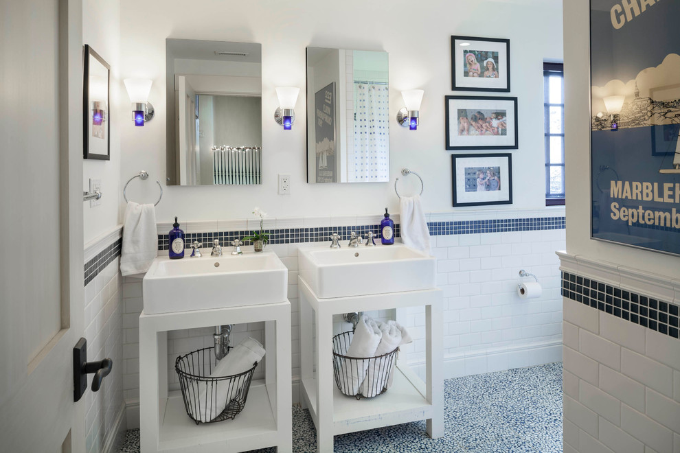 Inspiration for a mid-sized timeless 3/4 blue tile, white tile and ceramic tile mosaic tile floor bathroom remodel in Boston with open cabinets, white cabinets, white walls and a vessel sink