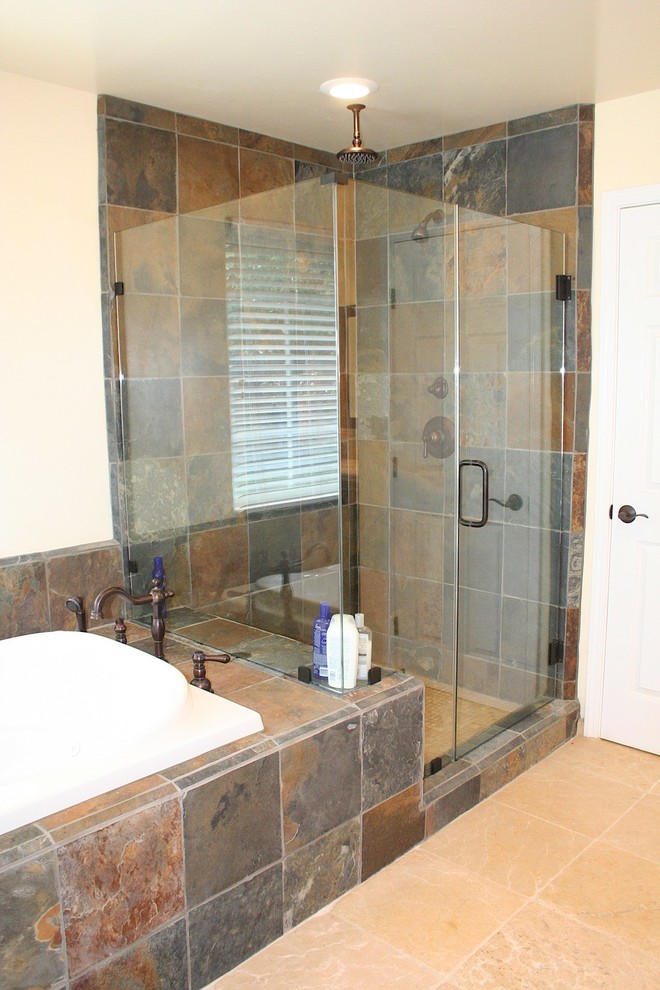 This is an example of a large traditional bathroom in Other with a vessel sink, shaker cabinets, medium wood cabinets, a hot tub, a corner shower, a two-piece toilet, beige tiles, stone tiles, beige walls and travertine flooring.