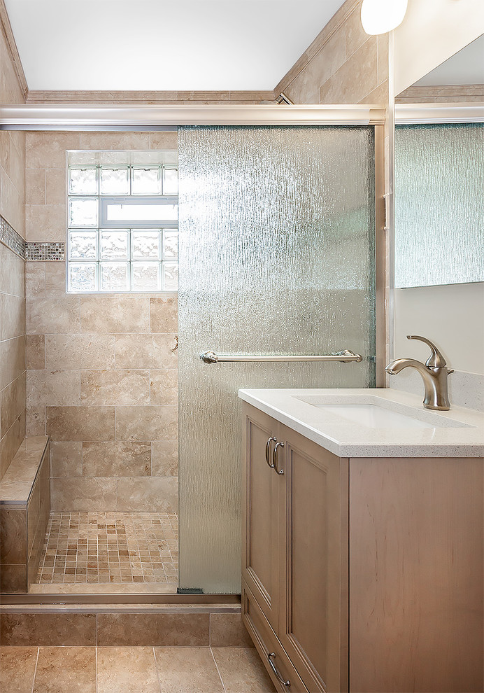 Small transitional master ceramic tile alcove shower photo in Chicago with recessed-panel cabinets, beige cabinets, beige walls and an undermount sink