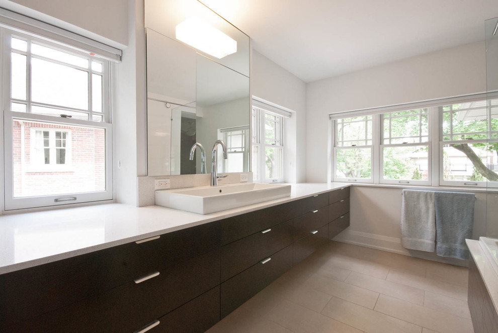 Inspiration for a huge contemporary master white tile and ceramic tile porcelain tile bathroom remodel in Toronto with a trough sink, flat-panel cabinets, dark wood cabinets, quartzite countertops, a one-piece toilet and white walls