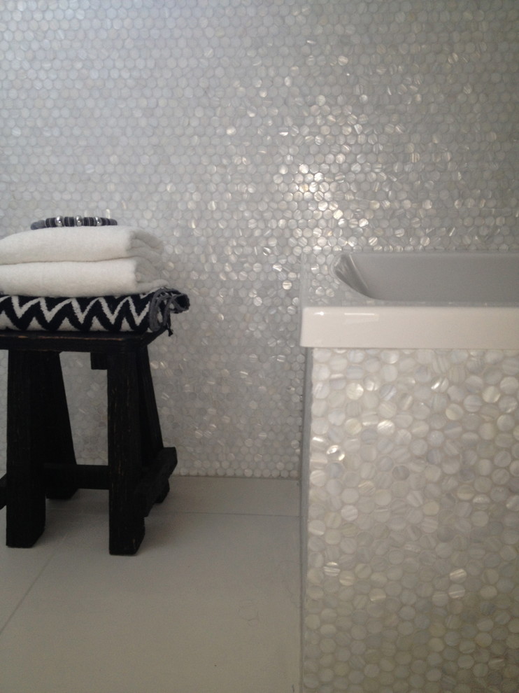 Inspiration for a contemporary white tile and mosaic tile bathroom remodel in Other