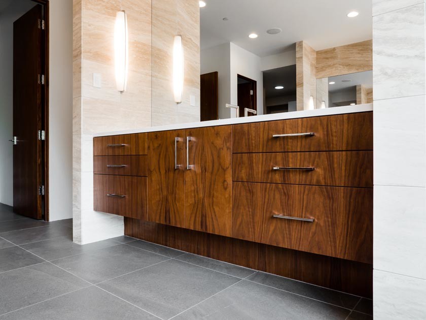 Inspiration for a small contemporary ensuite bathroom in Phoenix with flat-panel cabinets, medium wood cabinets, grey tiles, porcelain tiles, white walls, porcelain flooring, engineered stone worktops and grey floors.