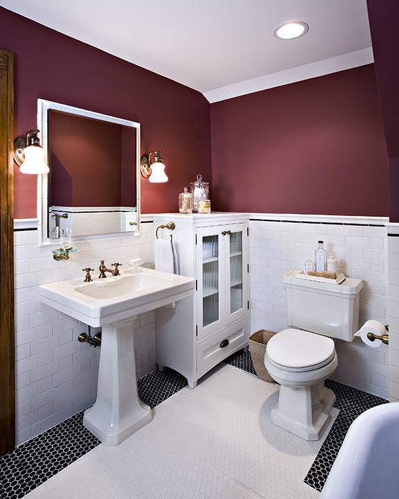 Inspiration for a small classic ensuite bathroom in Detroit with a pedestal sink, white cabinets, an alcove shower, a two-piece toilet, white tiles, ceramic tiles, red walls, ceramic flooring, glass-front cabinets, white floors and a hinged door.