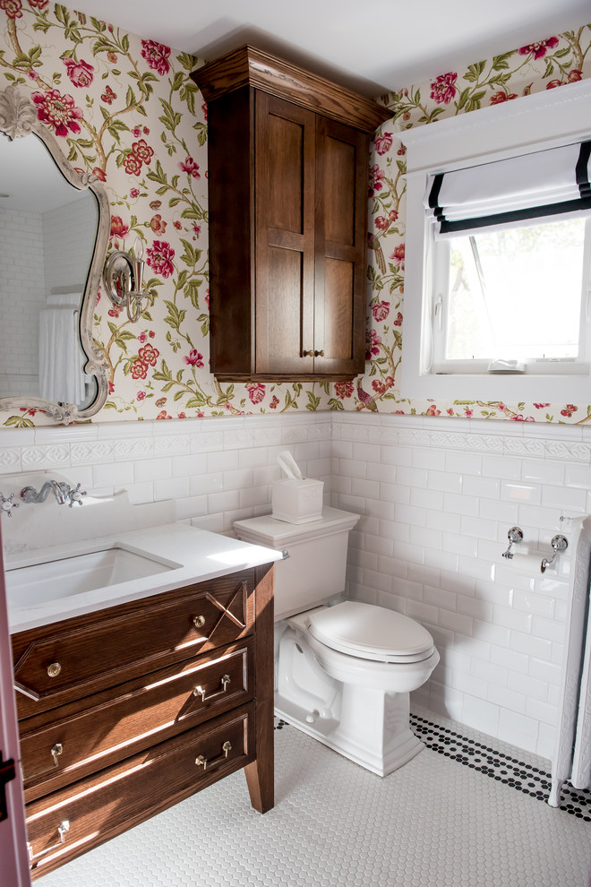 Mid-sized farmhouse black and white tile and ceramic tile mosaic tile floor bathroom photo in Other with a two-piece toilet, multicolored walls, an undermount sink and quartzite countertops