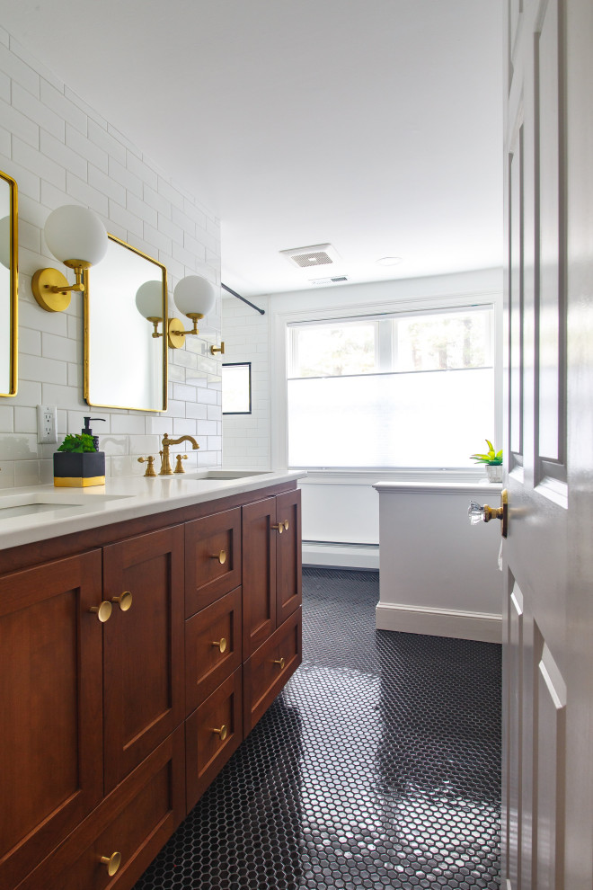 Mid-sized transitional white tile and subway tile ceramic tile, black floor and double-sink bathroom photo in Boston with shaker cabinets, medium tone wood cabinets, a two-piece toilet, white walls, an undermount sink, quartz countertops, white countertops and a built-in vanity