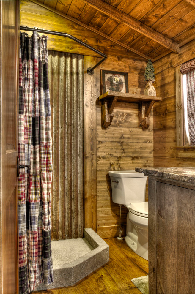 Rustic bathroom in Minneapolis with a corner shower.