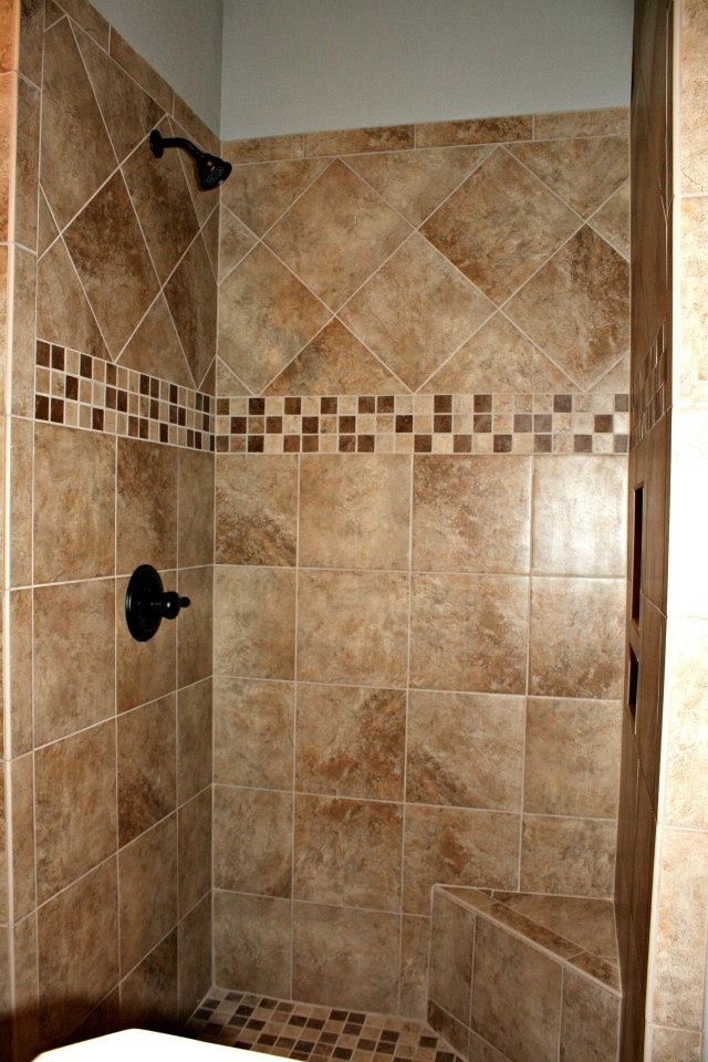 Bathroom - master beige tile and ceramic tile concrete floor bathroom idea in New Orleans with an undermount sink, raised-panel cabinets, medium tone wood cabinets, granite countertops and beige walls