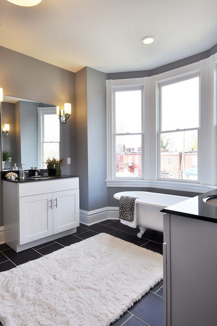 This is an example of a large classic ensuite bathroom in St Louis with an integrated sink, shaker cabinets, white cabinets, granite worktops, a claw-foot bath, black tiles, ceramic tiles, grey walls and ceramic flooring.