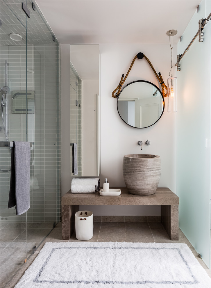 Example of a beach style bathroom design in San Francisco with a hinged shower door