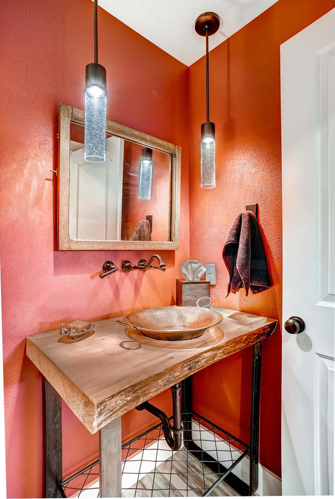 Inspiration for a small rustic 3/4 medium tone wood floor bathroom remodel in Denver with a vessel sink, open cabinets, medium tone wood cabinets, wood countertops and orange walls