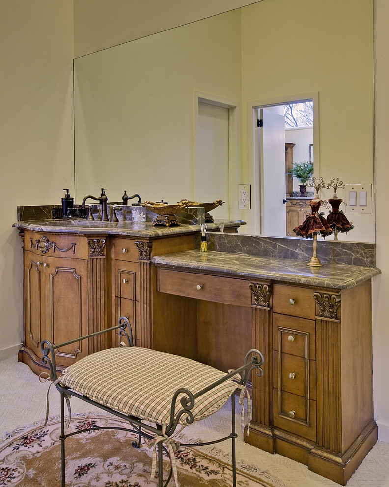 Example of a mountain style bathroom design in Other with medium tone wood cabinets and recessed-panel cabinets