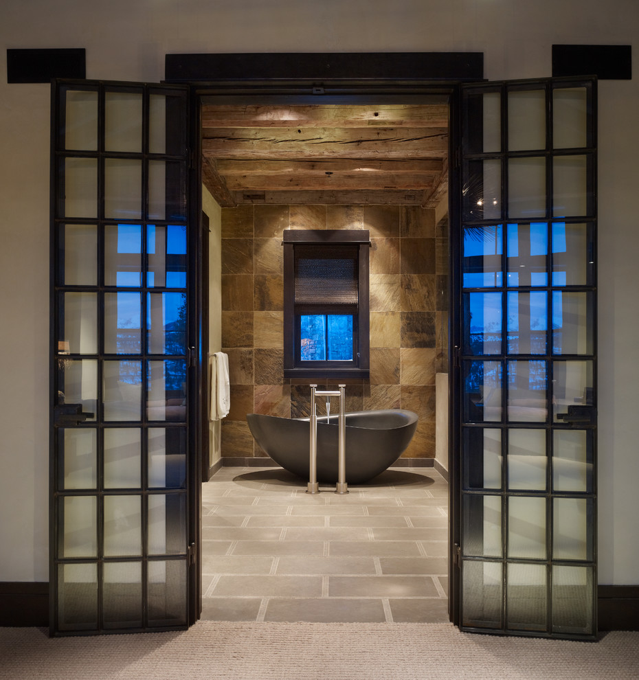 Design ideas for a rustic bathroom in Denver with a freestanding bath.