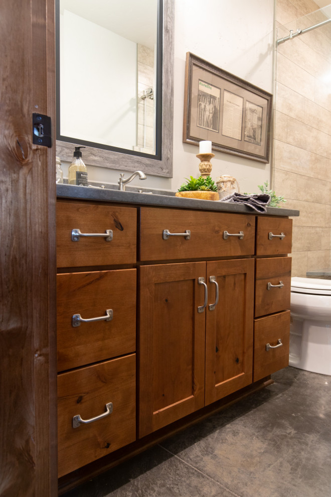 This is an example of a medium sized rustic family bathroom in Portland with shaker cabinets, medium wood cabinets, a two-piece toilet, grey walls, concrete flooring, a submerged sink, engineered stone worktops, grey floors and grey worktops.