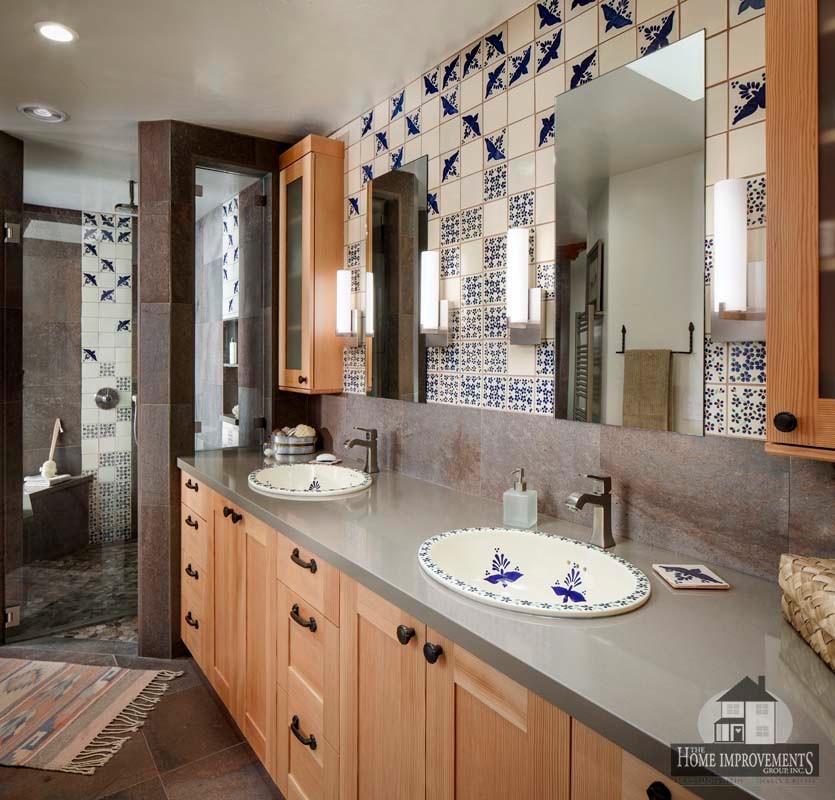 Example of a mountain style master terra-cotta tile porcelain tile bathroom design in Sacramento with flat-panel cabinets, light wood cabinets, a one-piece toilet, a drop-in sink and quartz countertops