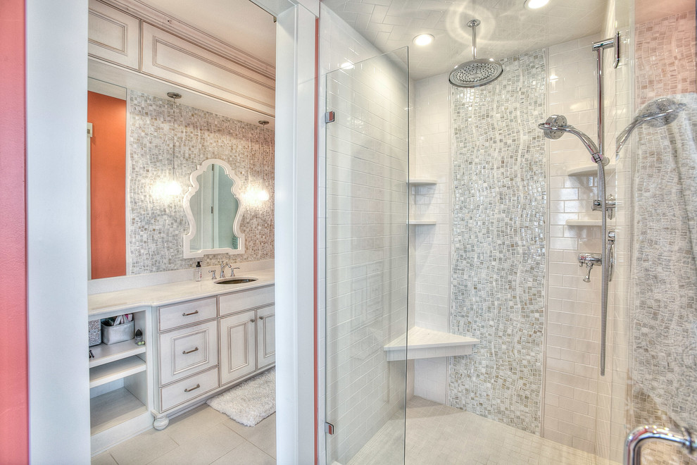 This is an example of a medium sized rustic shower room bathroom in Denver with flat-panel cabinets, medium wood cabinets, an alcove shower, a two-piece toilet, beige tiles, multi-coloured tiles, ceramic tiles, green walls, medium hardwood flooring, a submerged sink and engineered stone worktops.