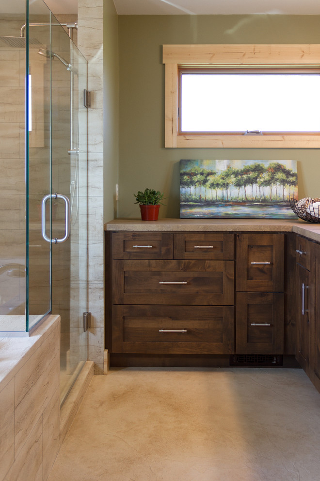 Bathroom - mid-sized farmhouse master beige tile and cement tile concrete floor and multicolored floor bathroom idea in Minneapolis with flat-panel cabinets, dark wood cabinets, green walls, an integrated sink, concrete countertops and a hinged shower door