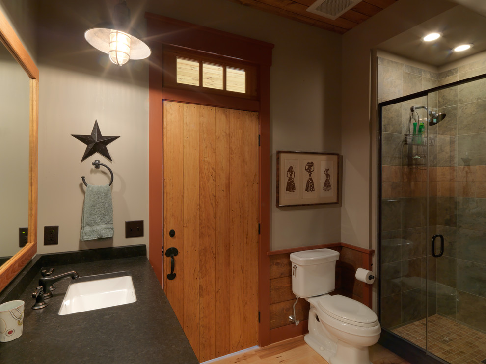Design ideas for a rustic bathroom in Burlington with medium wood cabinets and an alcove shower.