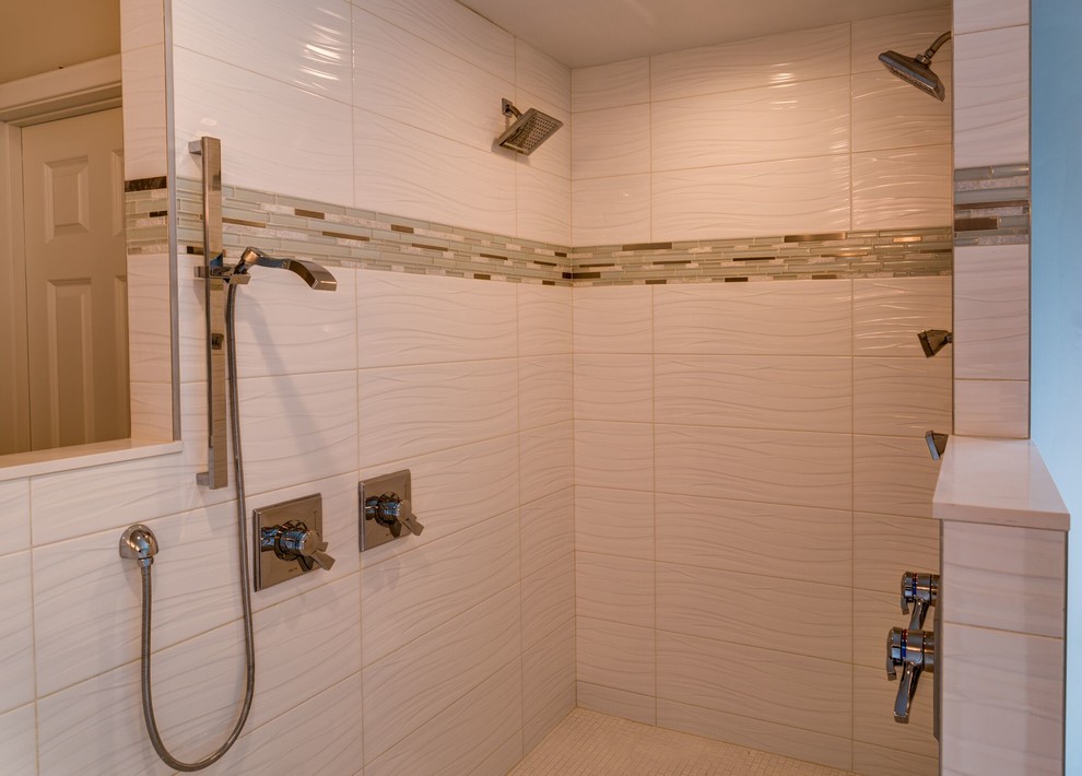 Photo of a medium sized classic ensuite bathroom in Columbus with dark wood cabinets, a two-piece toilet, white tiles, beige walls, shaker cabinets, a built-in bath, a corner shower, metro tiles, medium hardwood flooring, a submerged sink, marble worktops, brown floors and a hinged door.