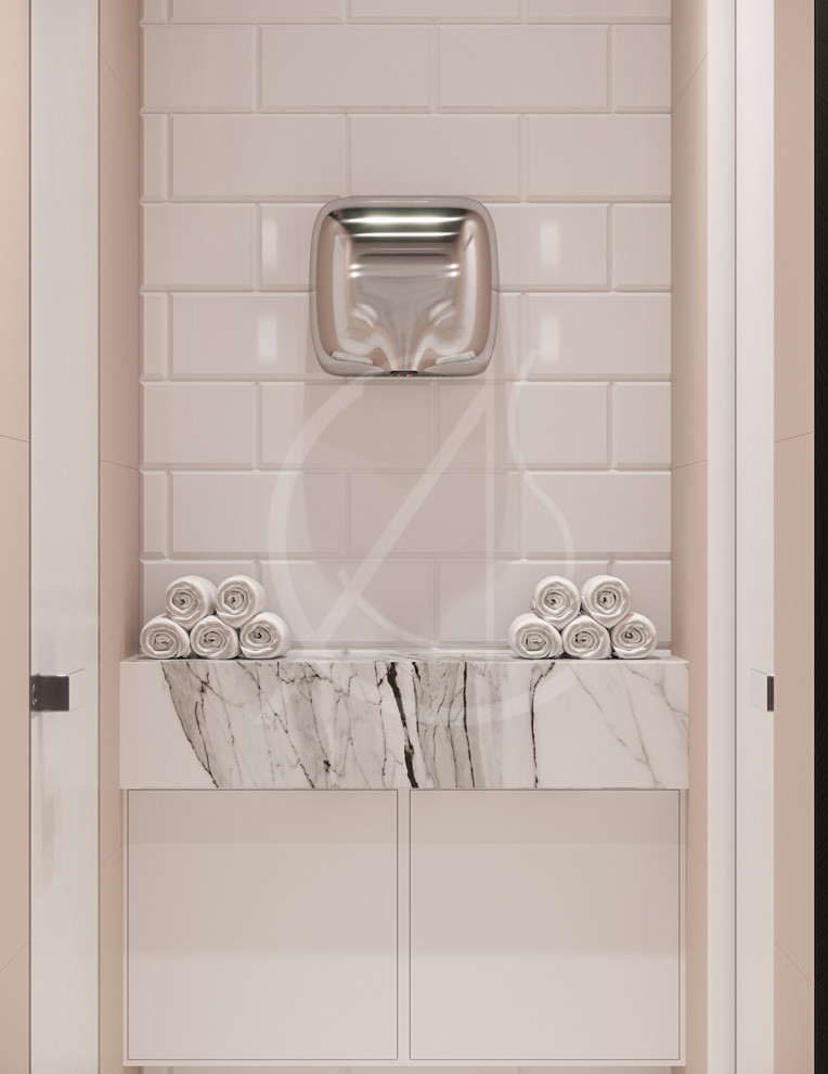 Inspiration för stora moderna vitt badrum med dusch, med släta luckor, vita skåp, en vägghängd toalettstol, vit kakel, tunnelbanekakel, vita väggar, marmorgolv, ett fristående handfat, marmorbänkskiva och vitt golv