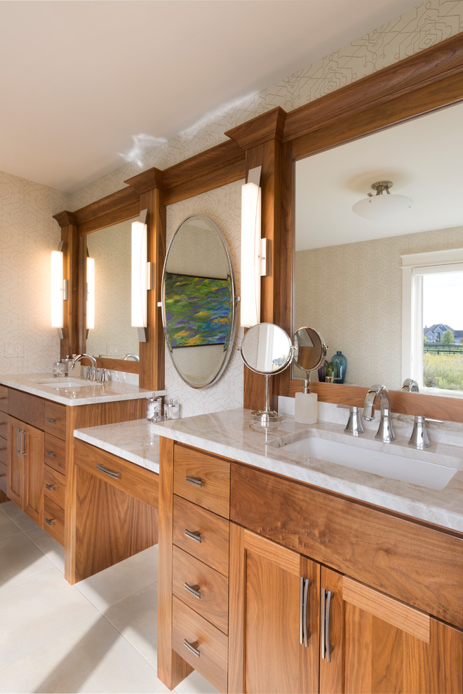 Example of a mid-sized classic master beige tile and porcelain tile porcelain tile and beige floor bathroom design in Milwaukee with furniture-like cabinets, medium tone wood cabinets, an undermount sink, beige walls, quartz countertops and white countertops