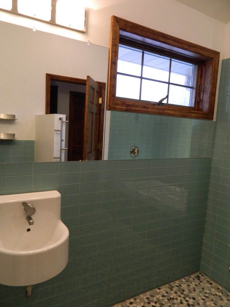 Trendy green tile and glass tile bathroom photo in Other