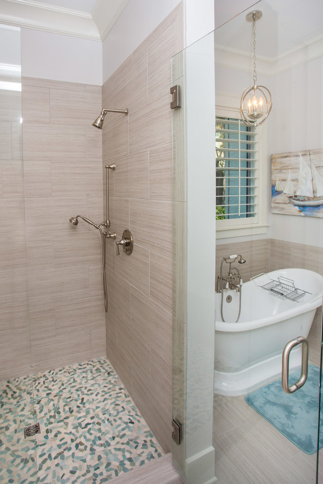 Photo of a large nautical sauna bathroom with beaded cabinets, white cabinets, a claw-foot bath, a one-piece toilet, multi-coloured tiles, mosaic tiles, white walls, mosaic tile flooring, a built-in sink and marble worktops.