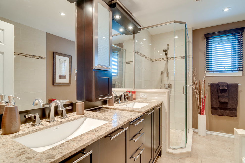 Medium sized traditional ensuite bathroom in Ottawa with a submerged sink, shaker cabinets, dark wood cabinets, granite worktops, a built-in bath, a corner shower, a one-piece toilet, multi-coloured tiles, ceramic tiles, brown walls and ceramic flooring.