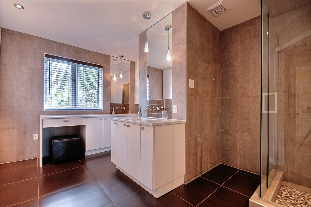 Large modern bathroom in Ottawa with a submerged sink, flat-panel cabinets, white cabinets, engineered stone worktops, a corner shower, grey tiles, porcelain tiles, grey walls and porcelain flooring.