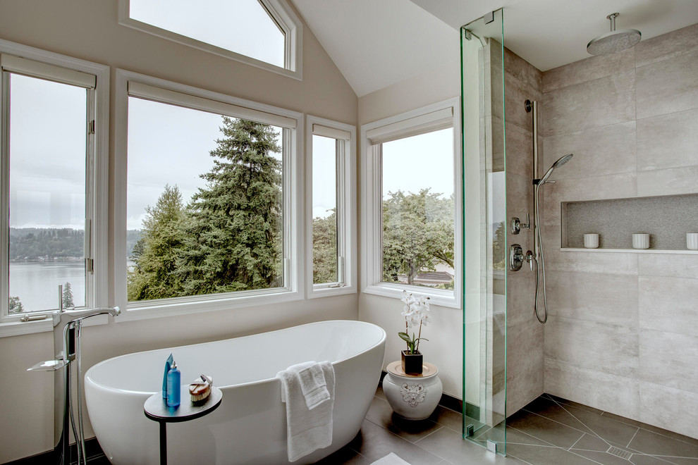 Inspiration for a mid-sized modern master gray tile and porcelain tile porcelain tile and gray floor bathroom remodel in Seattle with shaker cabinets, medium tone wood cabinets, an undermount sink, quartz countertops and white countertops
