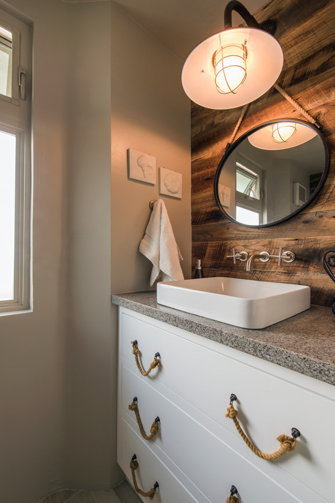 Inspiration for a mid-sized coastal 3/4 bathroom remodel in San Diego with a vessel sink, flat-panel cabinets, white cabinets, beige walls, quartz countertops and gray countertops