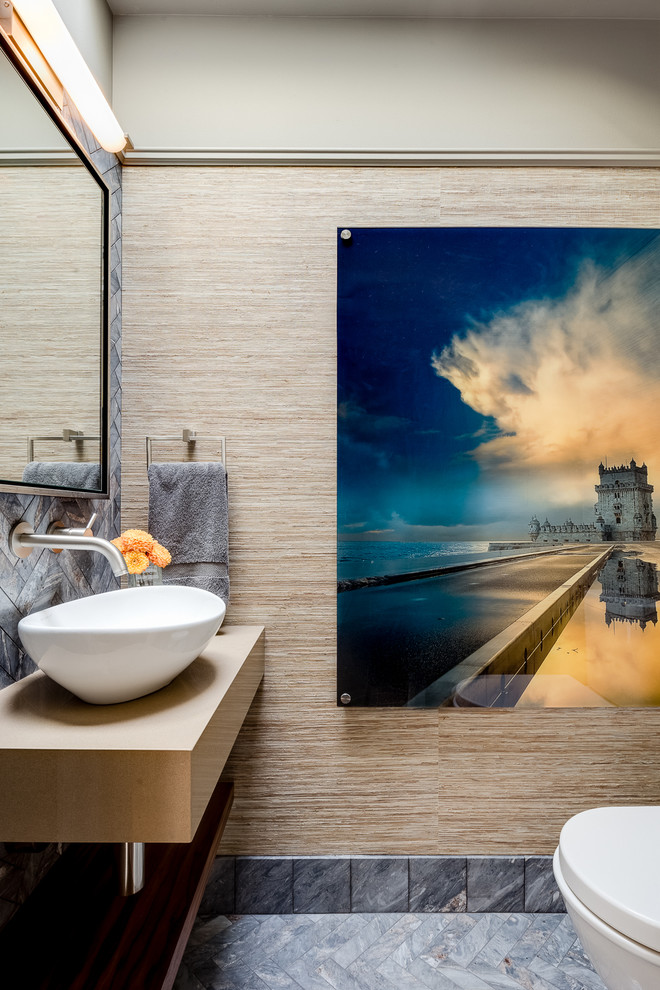 This is an example of a contemporary bathroom in San Francisco with a vessel sink, a built-in shower, ceramic tiles, beige walls and ceramic flooring.