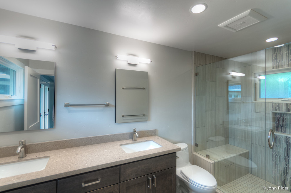 Design ideas for a small contemporary ensuite bathroom in San Francisco with recessed-panel cabinets, distressed cabinets, a corner shower, beige tiles, porcelain tiles, white walls and porcelain flooring.