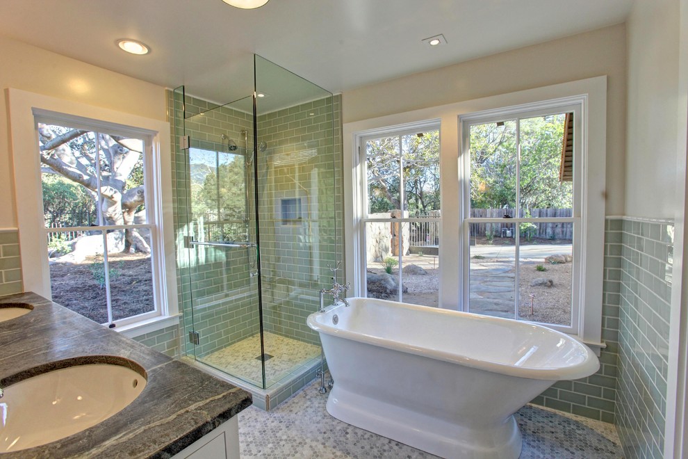 Example of a large southwest master gray tile mosaic tile floor and multicolored floor bathroom design in Santa Barbara with recessed-panel cabinets, white cabinets, white walls, an undermount sink, a hinged shower door, a two-piece toilet and granite countertops