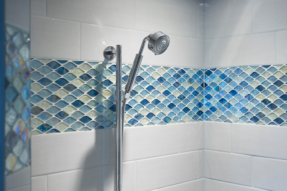 Alcove shower - mid-sized coastal blue tile, white tile and subway tile alcove shower idea in Other with shaker cabinets, white cabinets, green walls, an undermount sink, granite countertops, a hinged shower door and white countertops