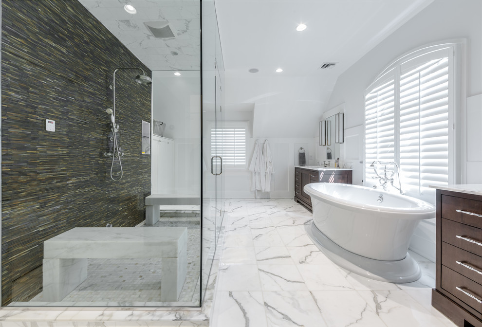Example of a large minimalist master multicolored tile and matchstick tile marble floor bathroom design in Tampa with flat-panel cabinets, dark wood cabinets, white walls, an undermount sink, marble countertops and a hinged shower door