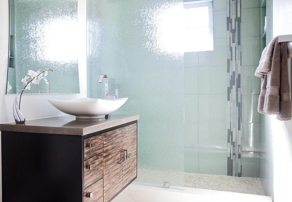 Inspiration for a contemporary bathroom remodel in Los Angeles with concrete countertops