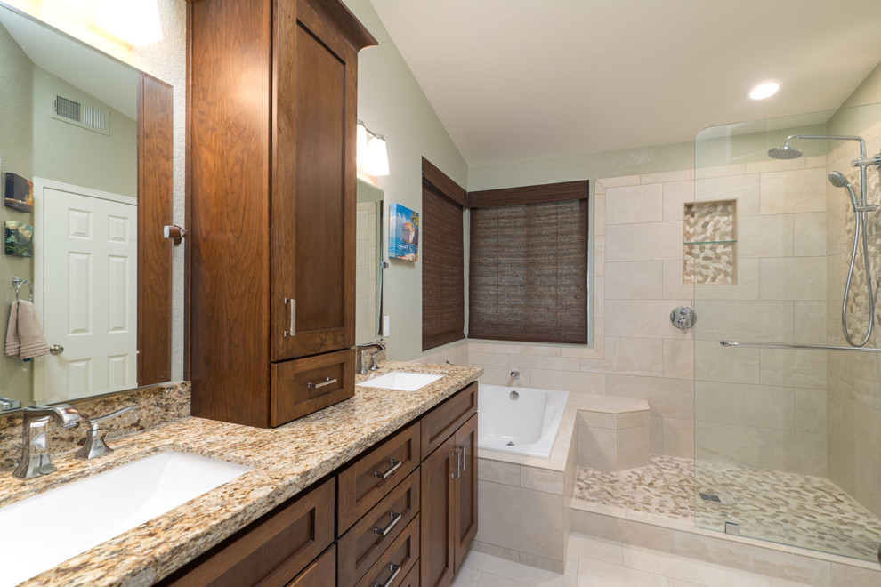 Bathroom - mid-sized traditional master beige tile and ceramic tile ceramic tile bathroom idea in San Diego with an undermount sink, raised-panel cabinets, medium tone wood cabinets, granite countertops, a one-piece toilet and beige walls