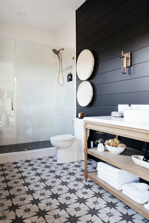 Sophisticated Contrast: A Black Shiplap Wall in a Gray White Bathroom Haven