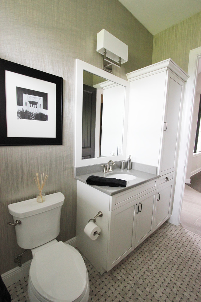 Example of a large country 3/4 multicolored tile and mosaic tile mosaic tile floor bathroom design in Tampa with shaker cabinets, white cabinets, a one-piece toilet, green walls, an undermount sink and quartz countertops