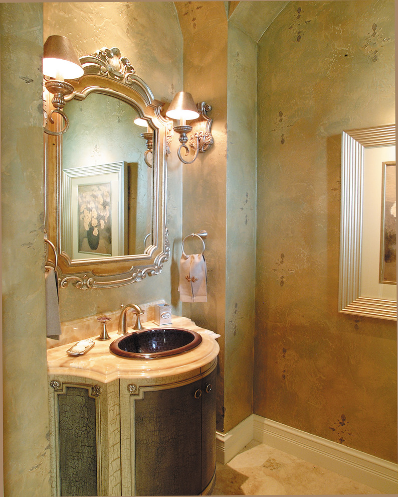 Example of a large tuscan 3/4 beige tile and stone tile travertine floor bathroom design in Miami with a drop-in sink, furniture-like cabinets, distressed cabinets, marble countertops, a two-piece toilet and beige walls