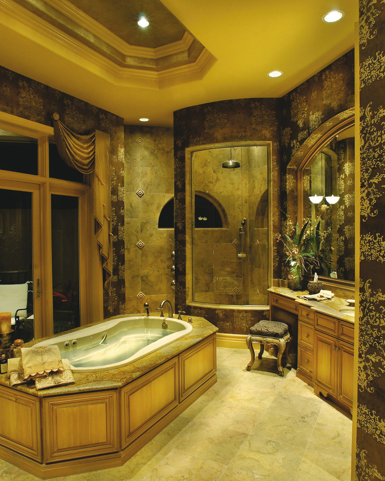 Large tuscan master beige tile and stone tile ceramic tile bathroom photo in Miami with an undermount sink, raised-panel cabinets, light wood cabinets, granite countertops, a one-piece toilet and brown walls