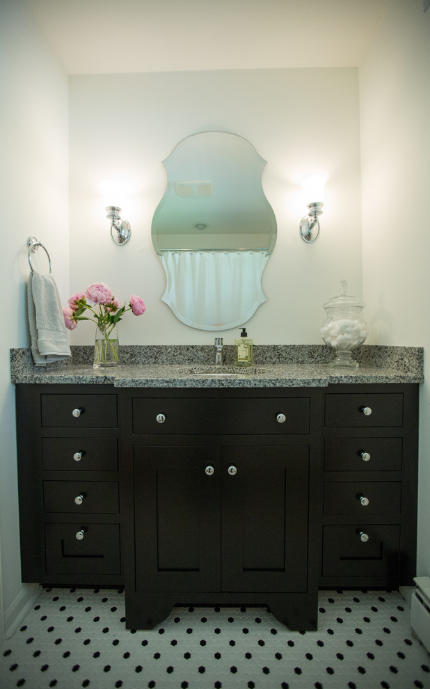 Example of a small 1950s white tile and ceramic tile ceramic tile bathroom design in Grand Rapids with an undermount sink, shaker cabinets, black cabinets, granite countertops, a two-piece toilet and white walls